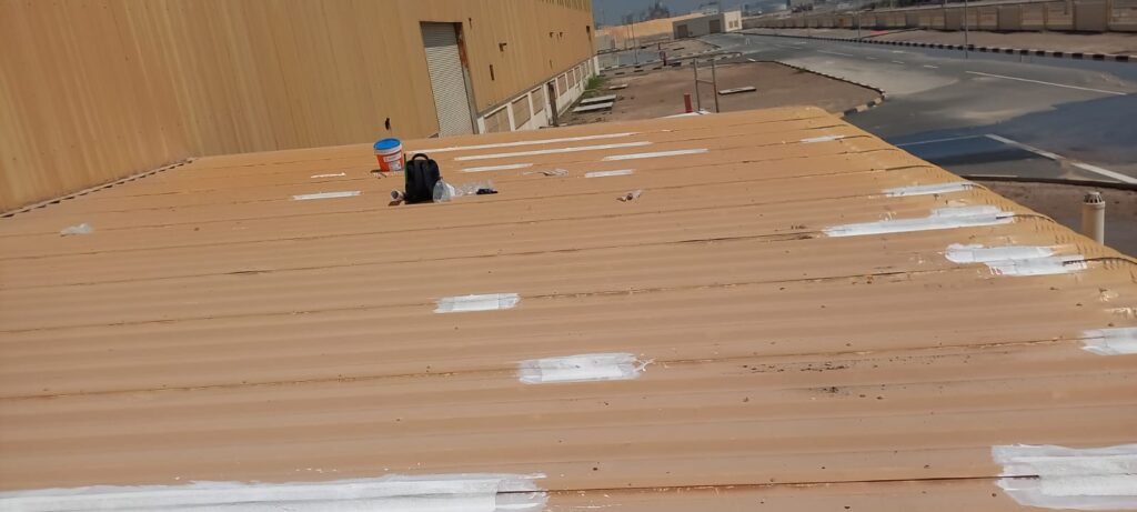 Metal roof leak repair work in Abu Dhabi